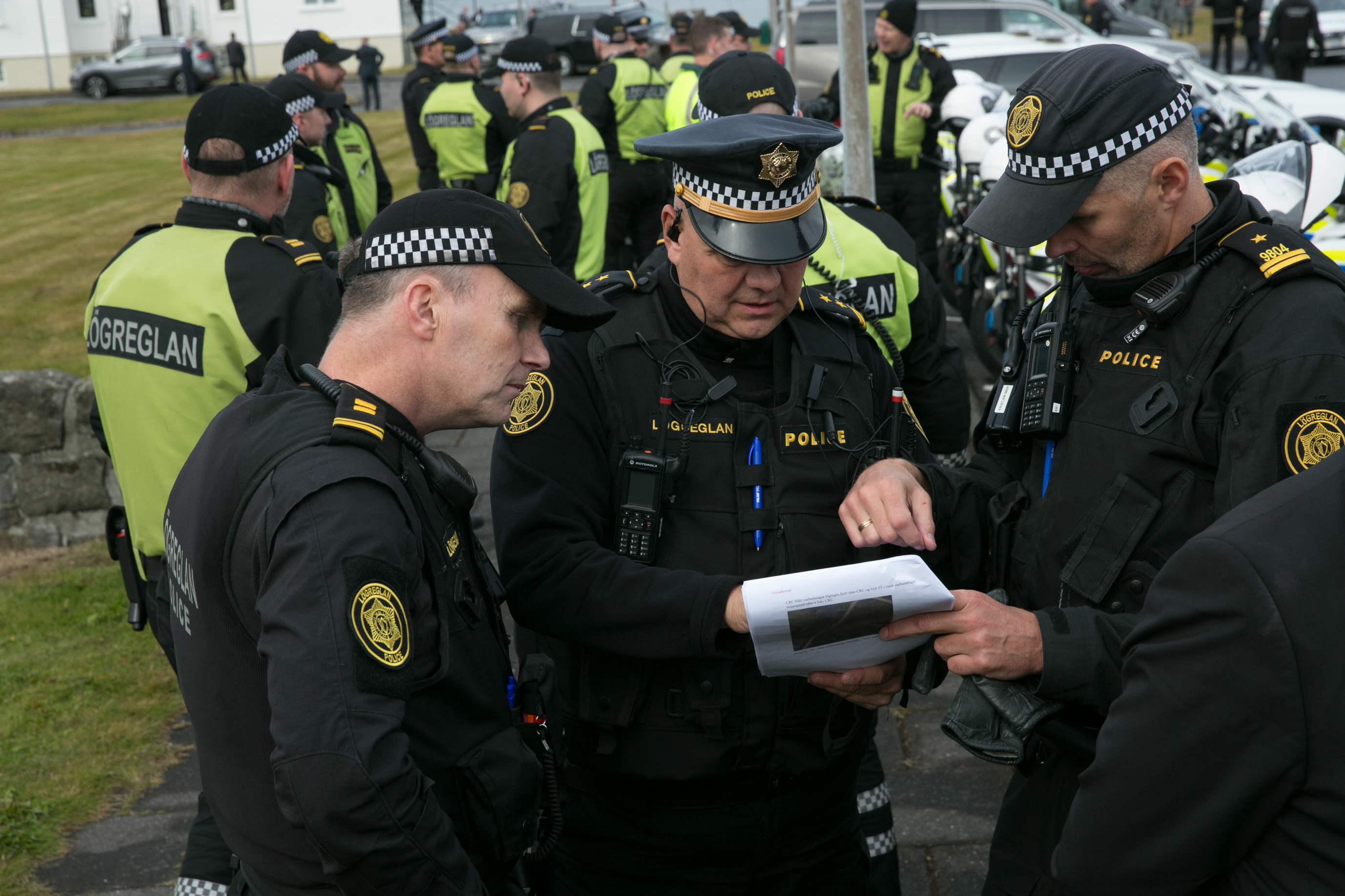 A group of police officers
Description automatically generated with low confidence