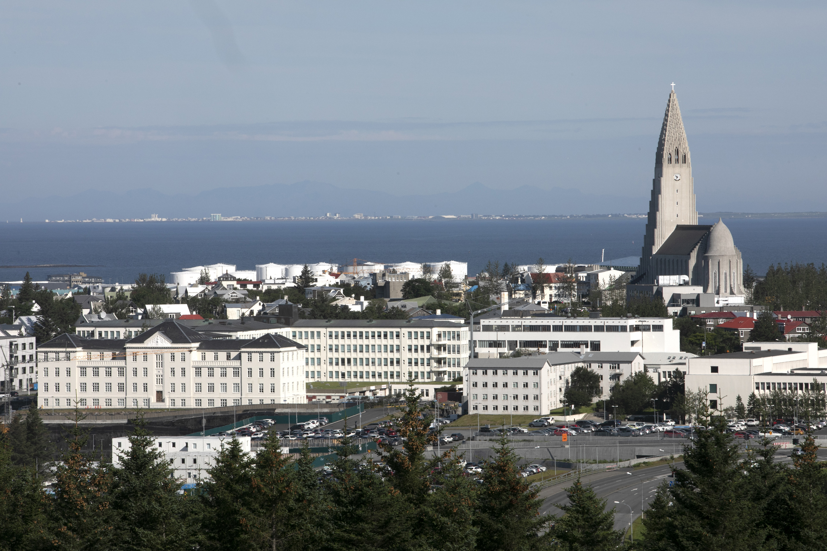 A picture containing outdoor, sky, tree, city
Description automatically generated